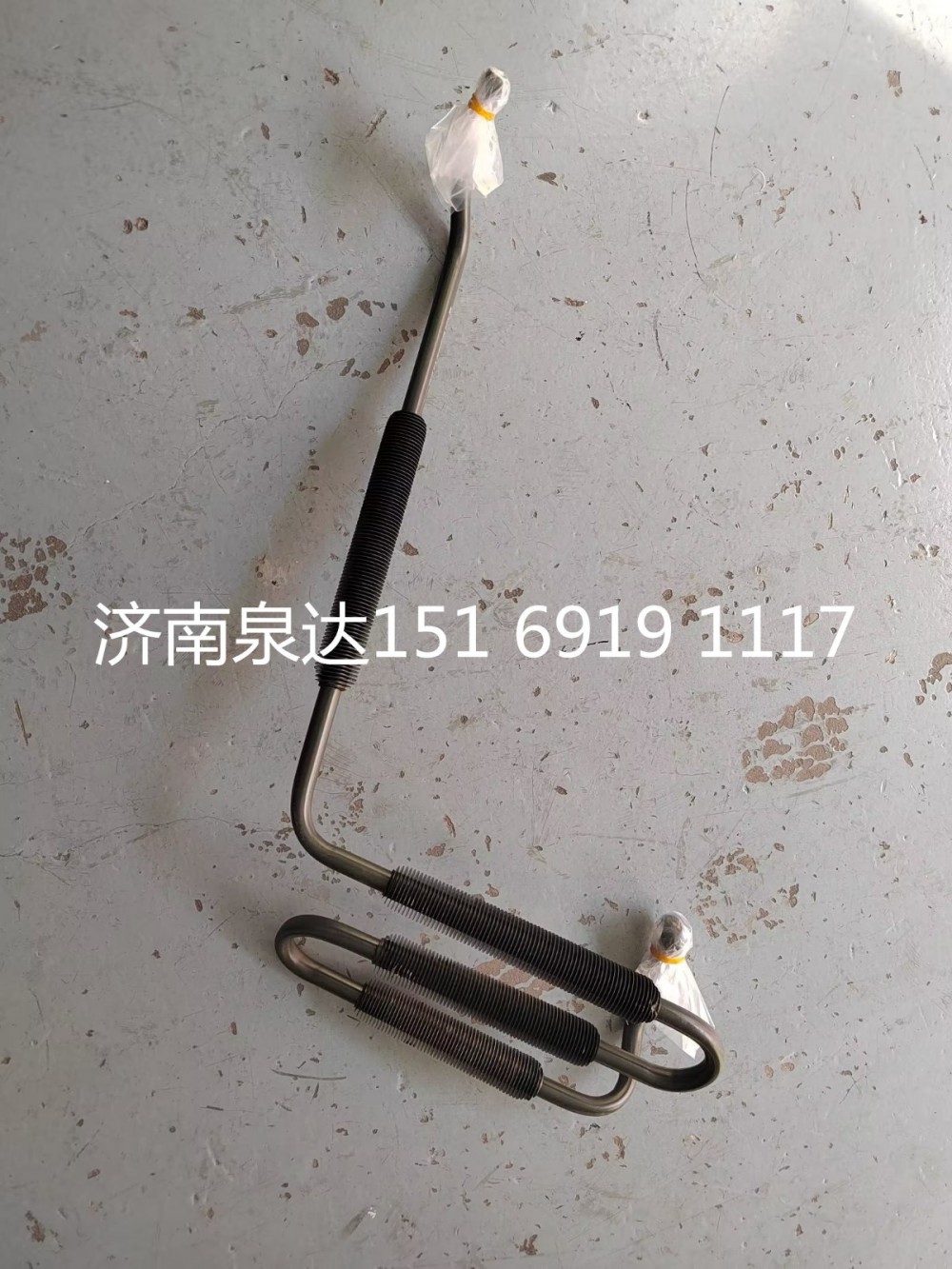 重汽豪沃轉(zhuǎn)向器方向機回油管帶散熱片回油鋼管總成/WG9725478135